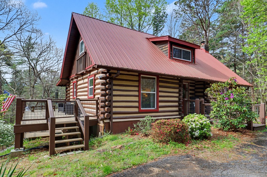 4609 Matheson Road Hiawassee, GA 30546 - Photo 7 of 57 a front view of a house with a yard