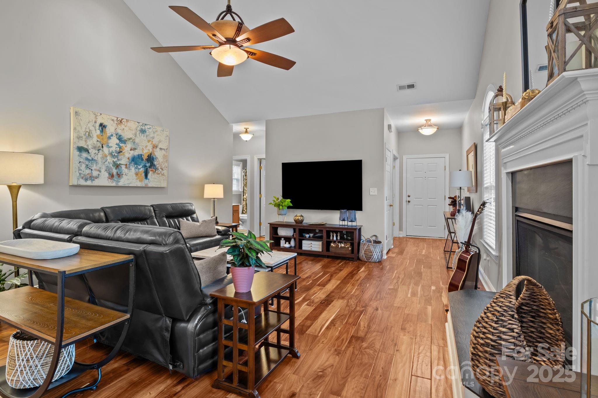 802 Seipel Drive Denver, NC 28037 - Photo 18 of 35 a living room with furniture and a flat screen tv