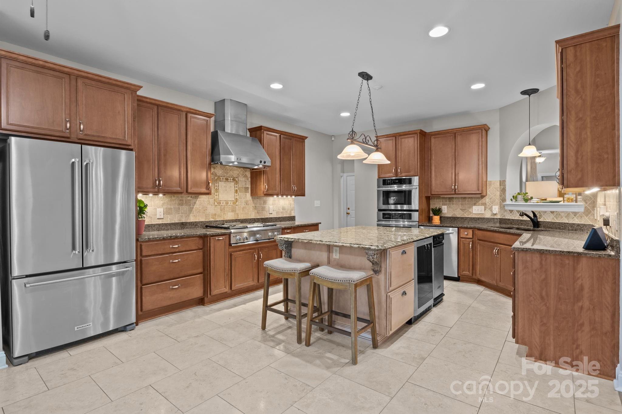 802 Seipel Drive Denver, NC 28037 - Photo 22 of 35 a large kitchen with cabinets