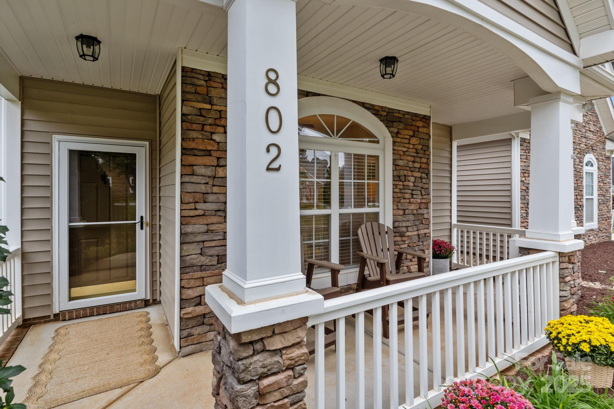 802 Seipel Drive Denver, NC 28037 - Photo 3 of 35 a view of porch with a bench