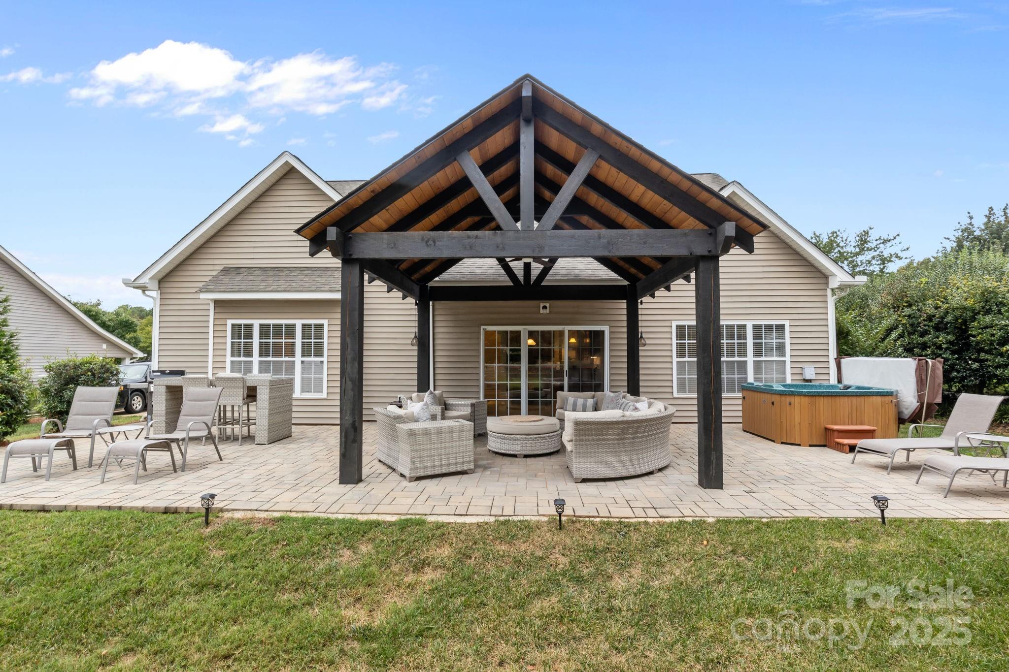 802 Seipel Drive Denver, NC 28037 - Photo 4 of 35 a front view of a house with patio
