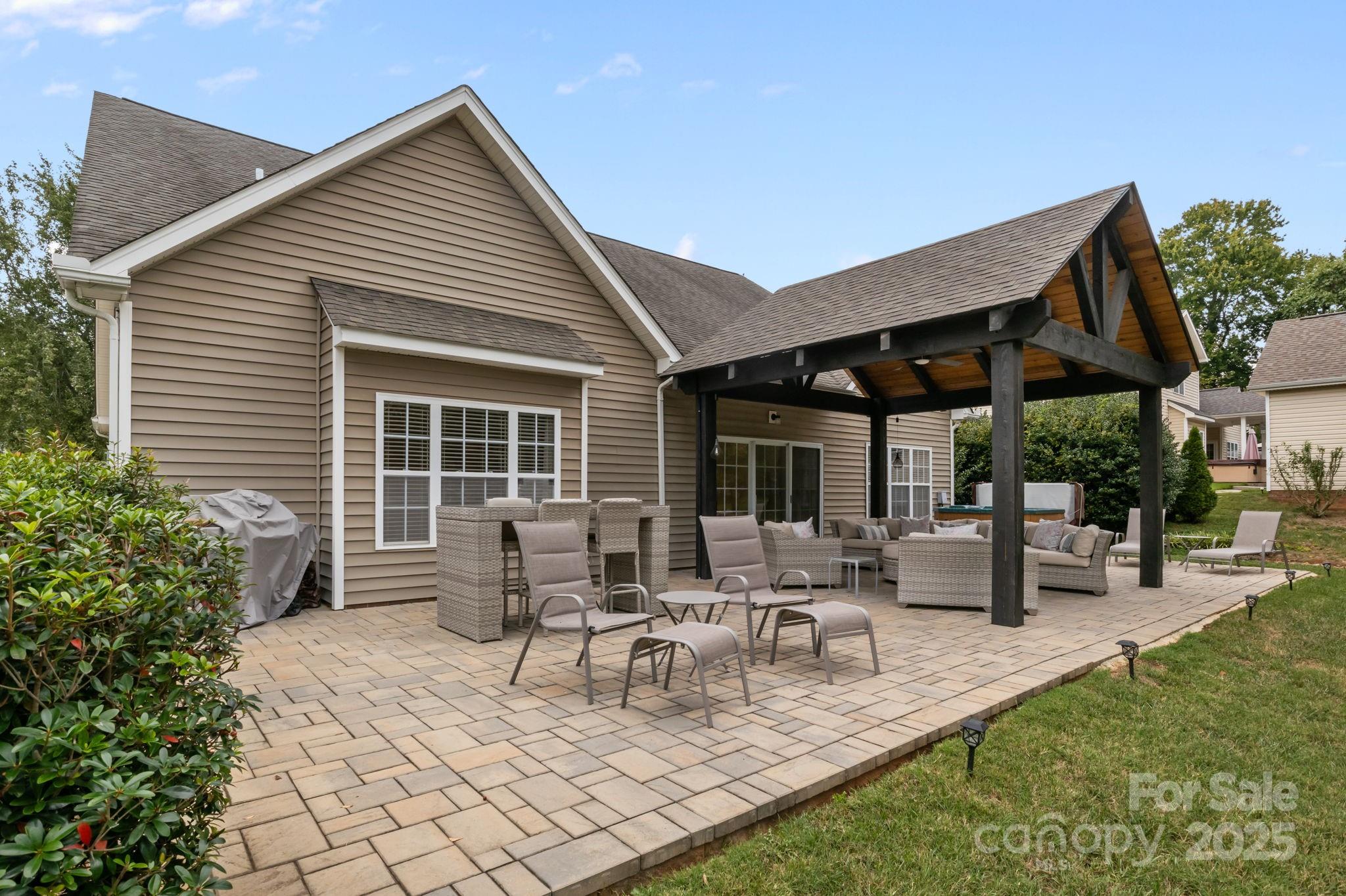 802 Seipel Drive Denver, NC 28037 - Photo 5 of 35 a view of a house with patio and sitting area