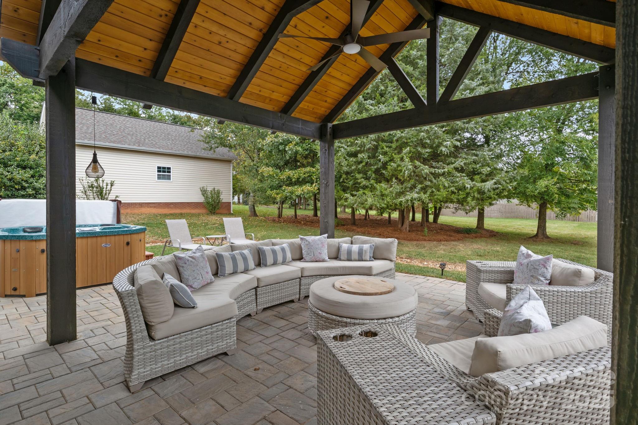 802 Seipel Drive Denver, NC 28037 - Photo 6 of 35 a outdoor living space with patio furniture and a garden