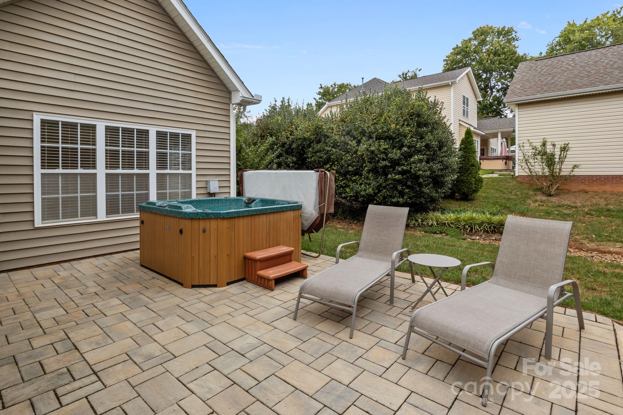 802 Seipel Drive Denver, NC 28037 - Photo 7 of 35 a view of a chair and tables in the back yard of the house