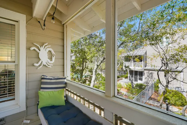 a view of a balcony with chairs