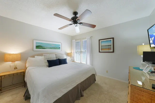 a front view of a building with garden