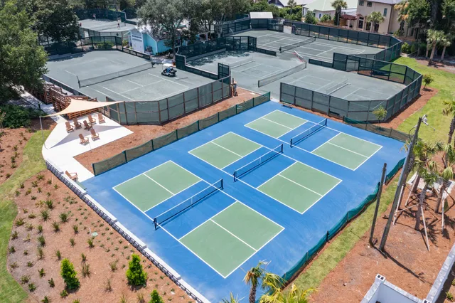 a view of a house with a yard and garden