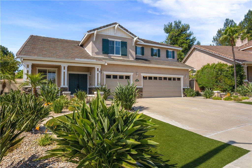 33351 Nicholas Common Temecula, CA 92592 - Photo 5 of 42 front view of a house with a yard