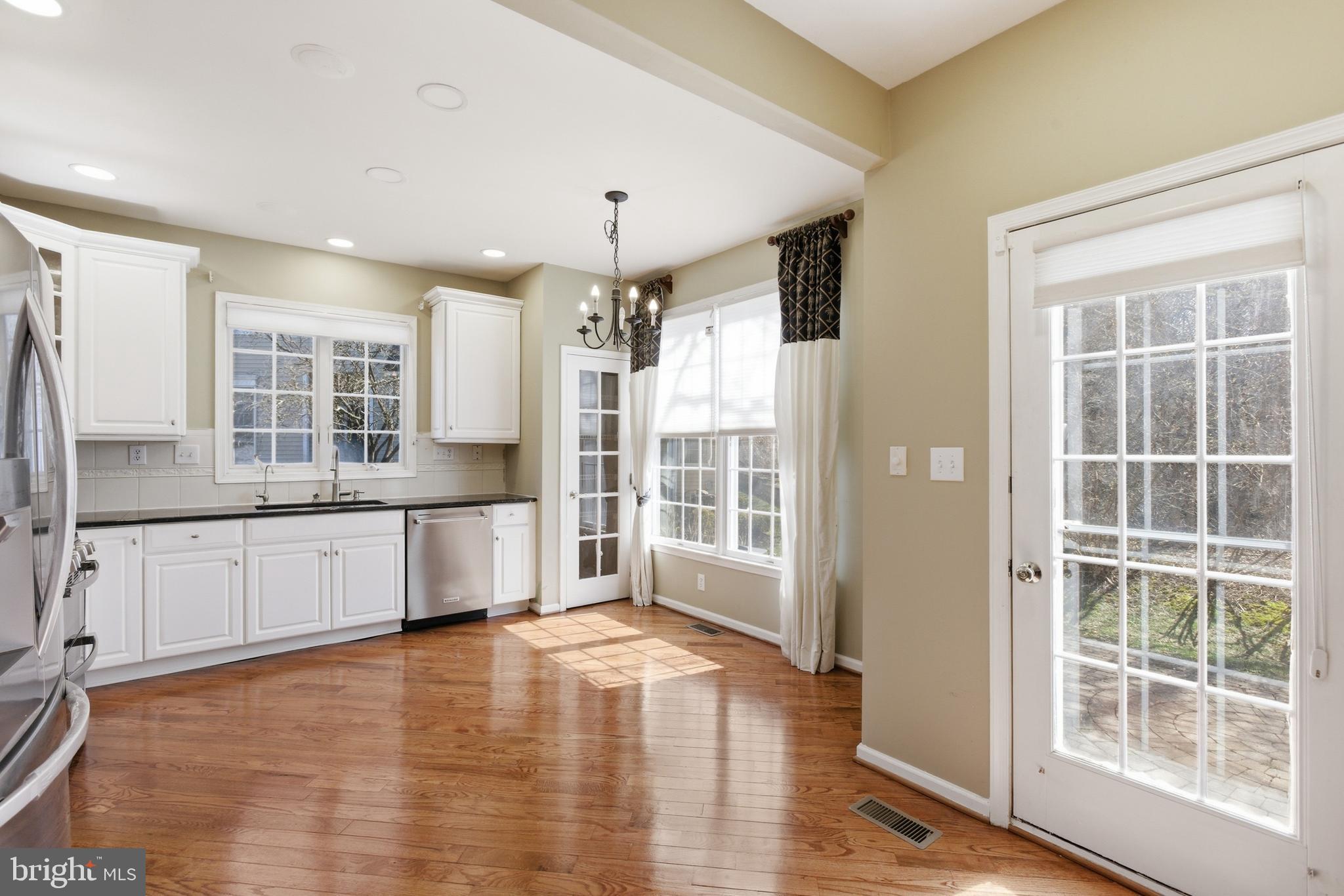 45 Tree Swallow Drive Princeton, NJ 08540 - Photo 15 of 41 a large kitchen with granite countertop a large window and a counter space