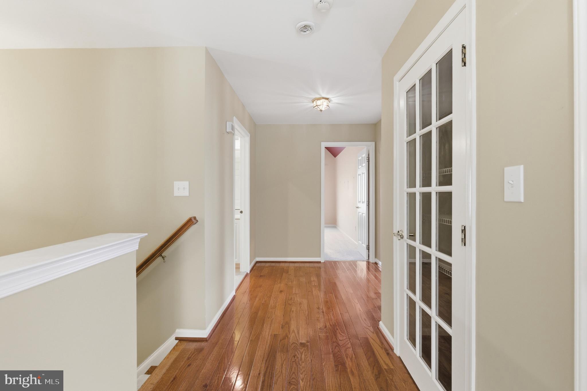 45 Tree Swallow Drive Princeton, NJ 08540 - Photo 17 of 41 a view of a hallway with wooden floor and staircase