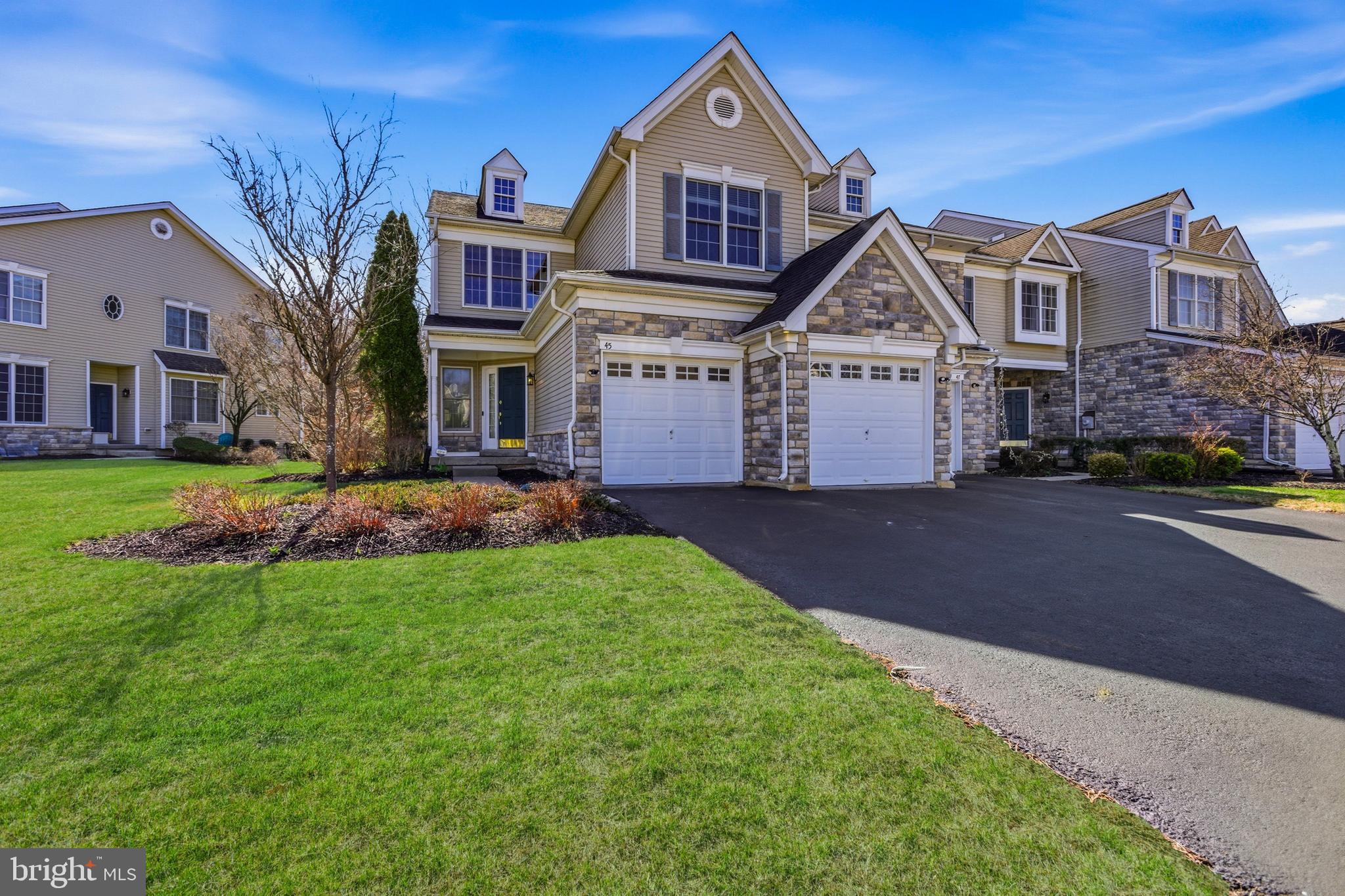 45 Tree Swallow Drive Princeton, NJ 08540 - Photo 2 of 41 front view of a house with a yard