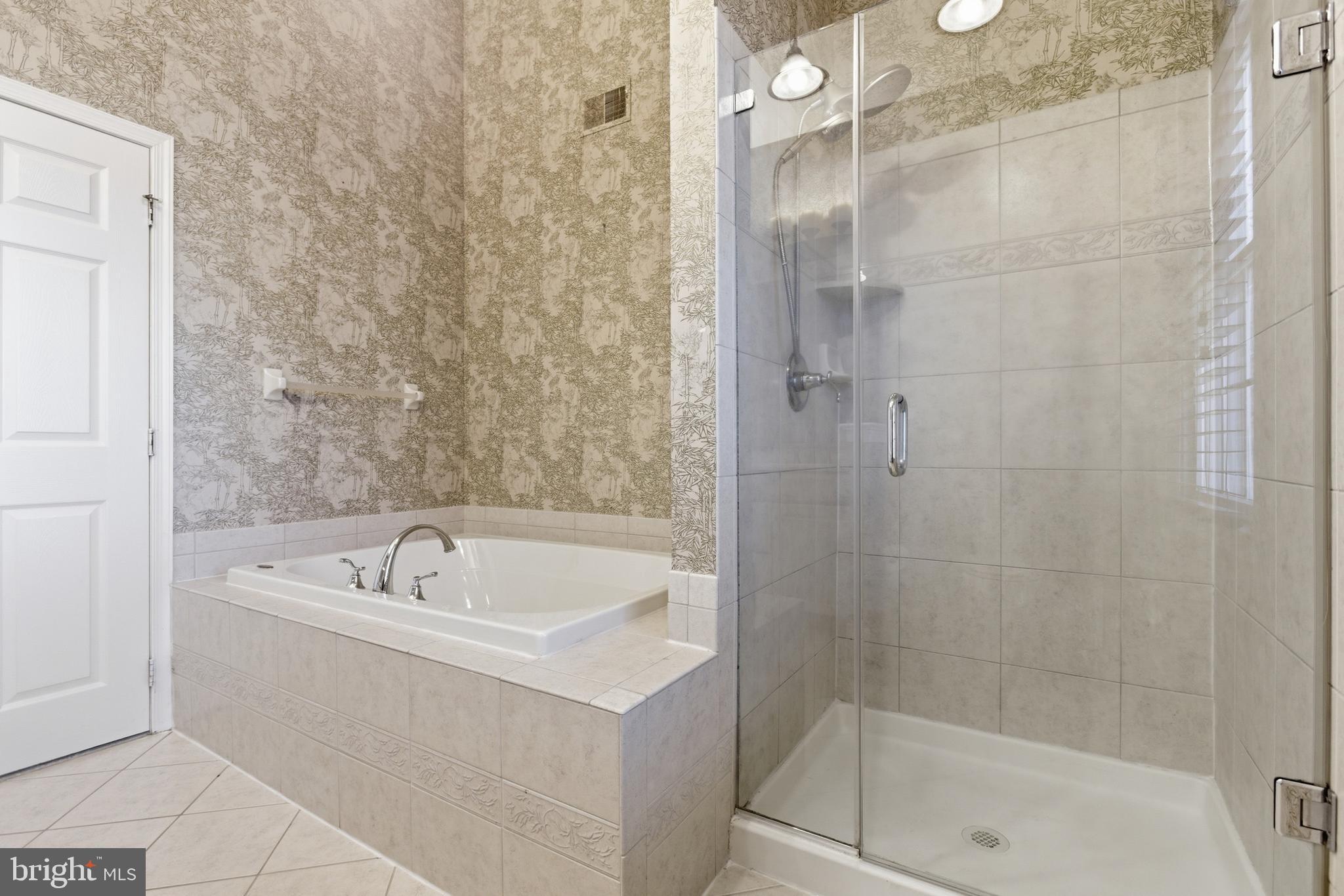 45 Tree Swallow Drive Princeton, NJ 08540 - Photo 23 of 41 a white bath tub sitting next to a shower