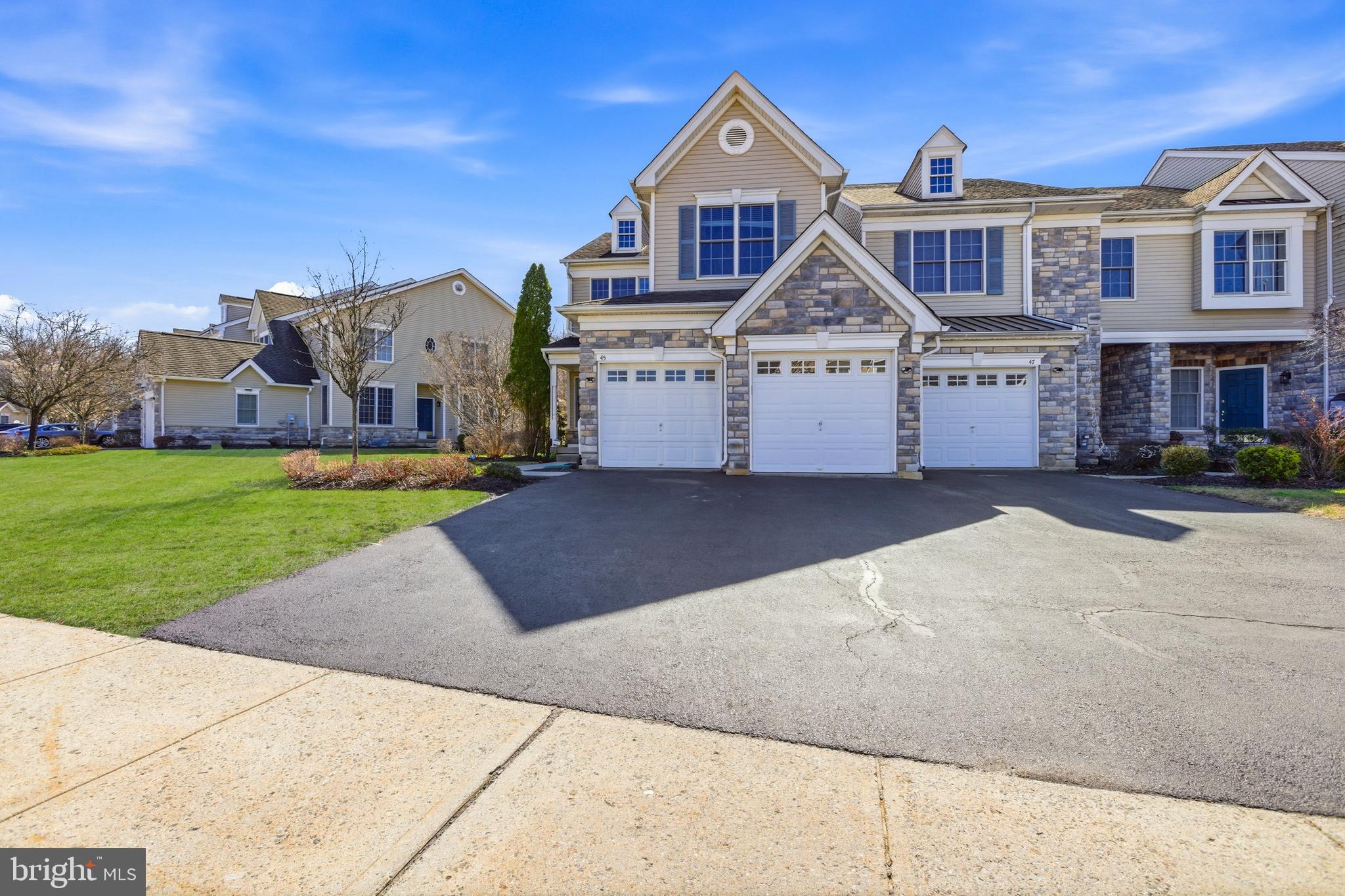 45 Tree Swallow Drive Princeton, NJ 08540 - Photo 3 of 41 a view of a big house with a big yard and large trees