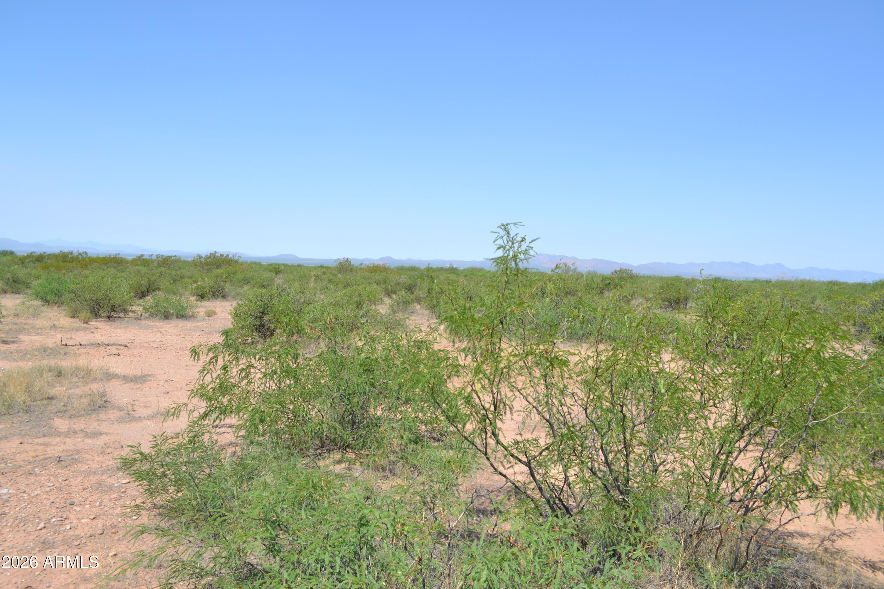 Tbd West Aqua Blanca Road Elfrida, AZ 85610 - Photo 31 of 33 a view of a lake with houses in the back