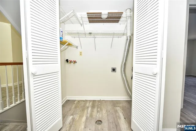 a view of a bathroom with a white door
