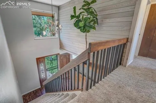 a spacious bedroom with a bed and a table