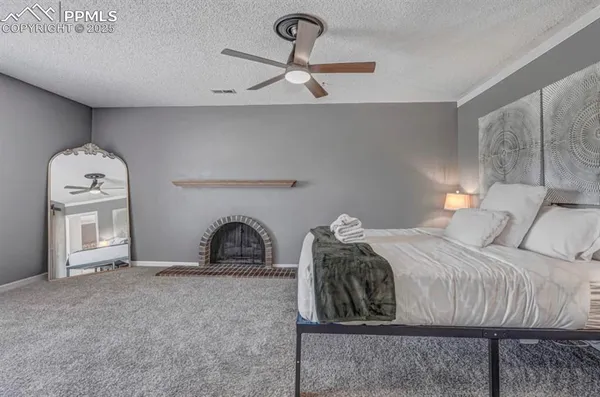 a room that has a bed and a window