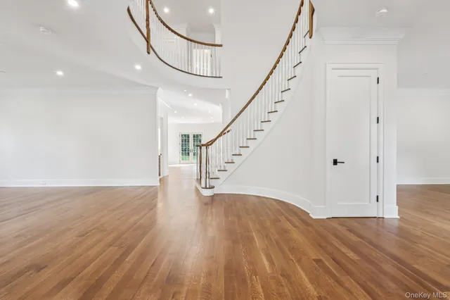 a view of entryway with wooden floor