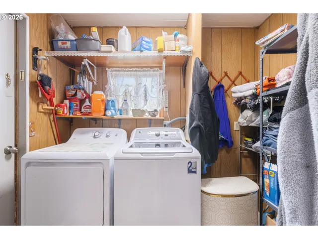 a utility room with dryer and washer