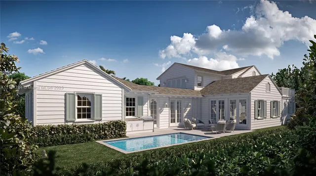 a front view of house with yard outdoor seating and barbeque oven