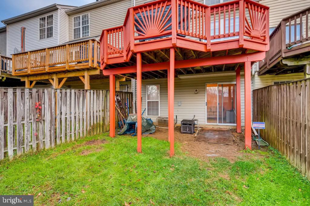 7410 Maury Road Windsor Mill, MD 21244 - Photo 27 of 28 a view of a house with a yard and sitting area