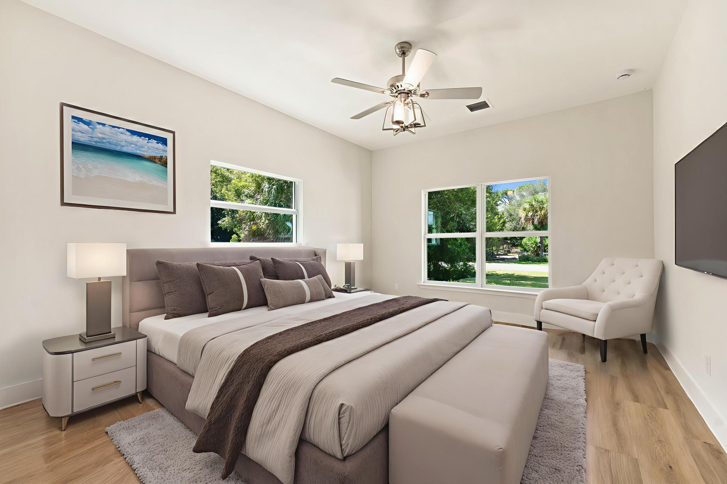 5310 Sunset Boulevard Fort Pierce, FL 34982 - Photo 20 of 39 a bed room with a bed and a chandelier