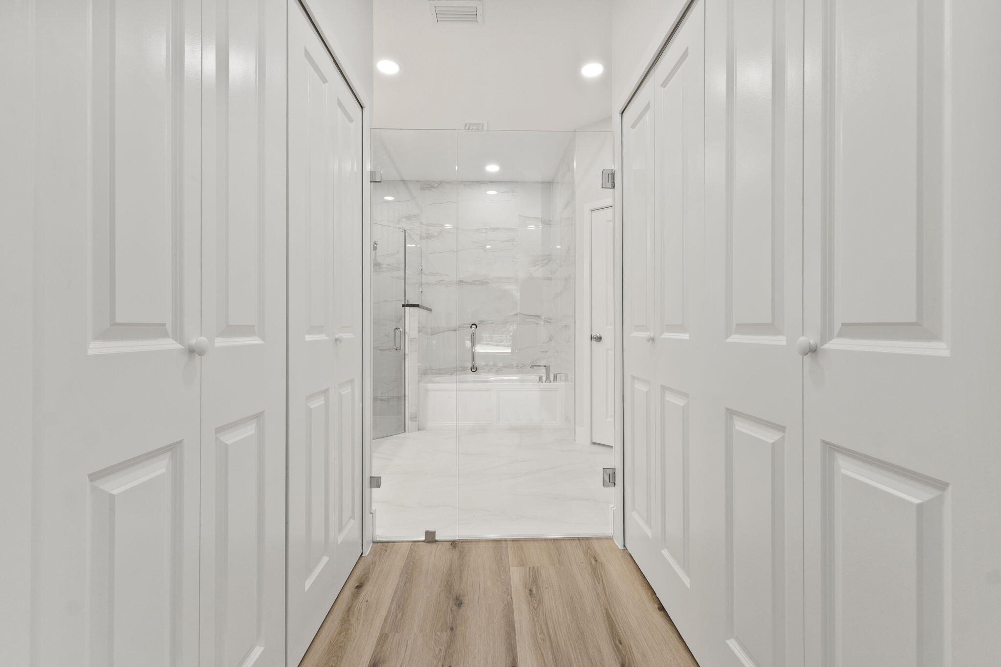 5310 Sunset Boulevard Fort Pierce, FL 34982 - Photo 23 of 39 a bathroom with a glass shower door