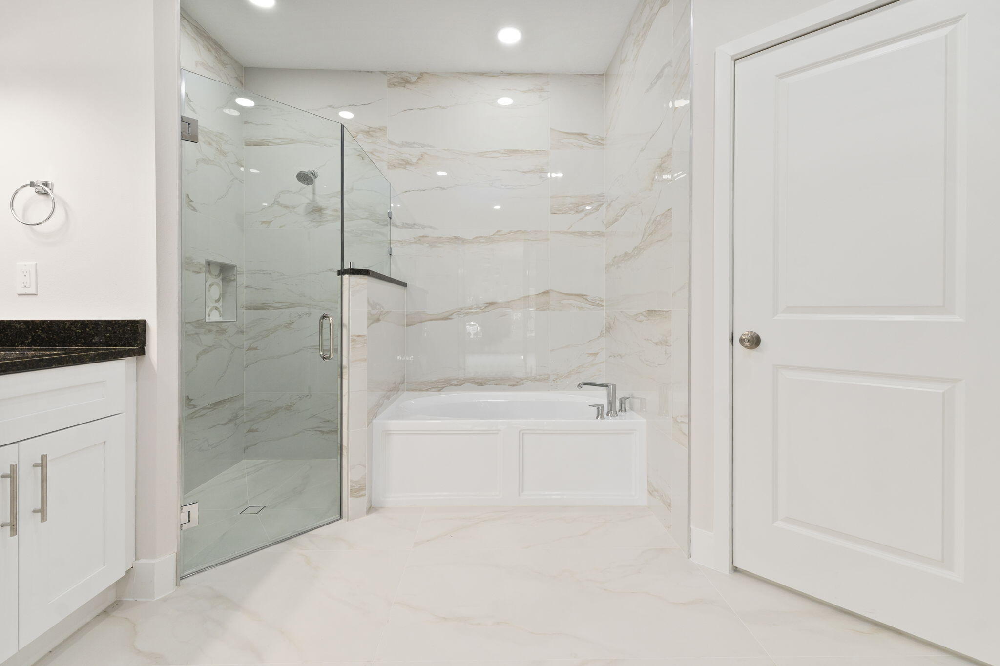 5310 Sunset Boulevard Fort Pierce, FL 34982 - Photo 27 of 39 a bathroom with a bathtub and a shower