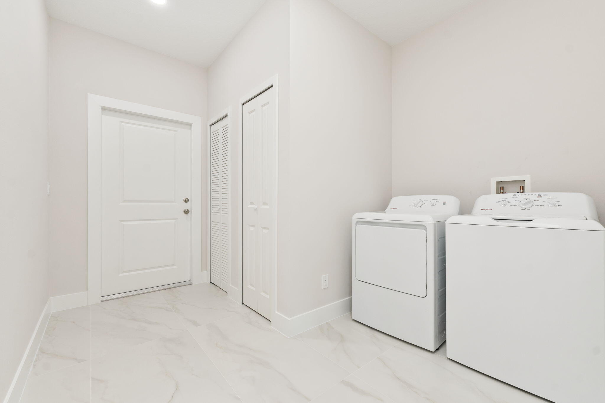 5310 Sunset Boulevard Fort Pierce, FL 34982 - Photo 33 of 39 a utility room with dryer and washer