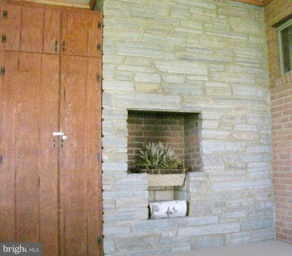 1865 Poplar Ridge Road Pasadena, MD 21122 - Photo 8 of 18 Fireplace