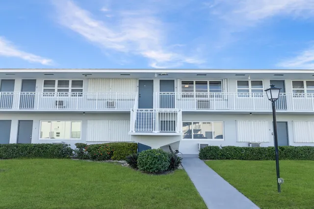 a view of a balcony with city view