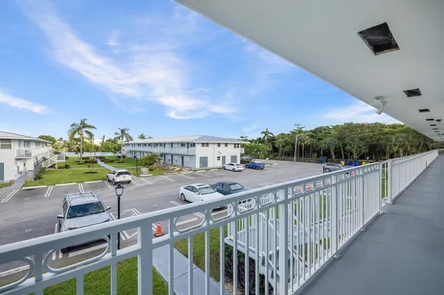 a view of balcony with furniture