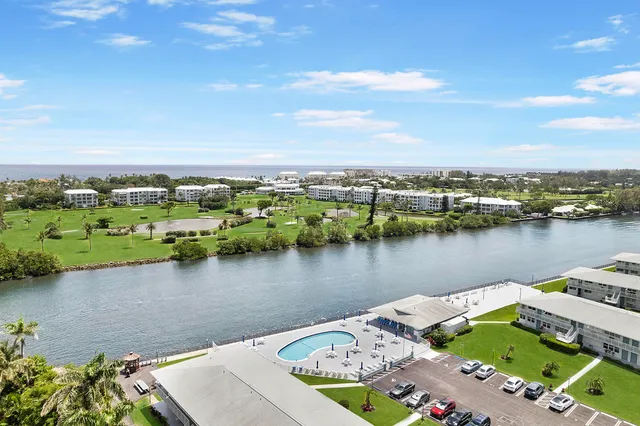 a view of a lake with houses with outdoor space