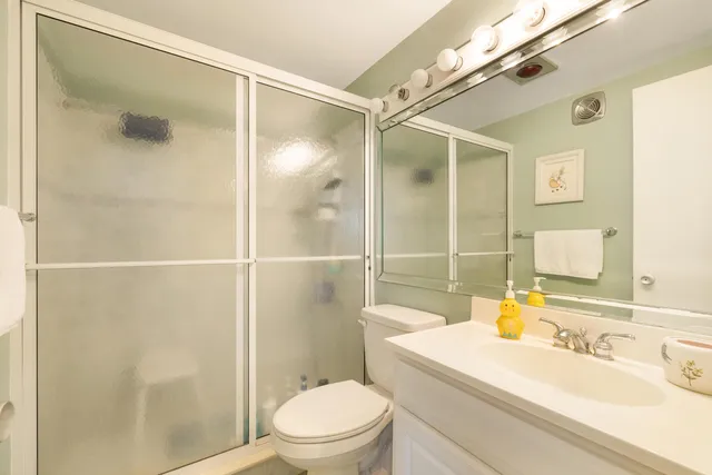 a picture of city view with lake view and mountain view in back