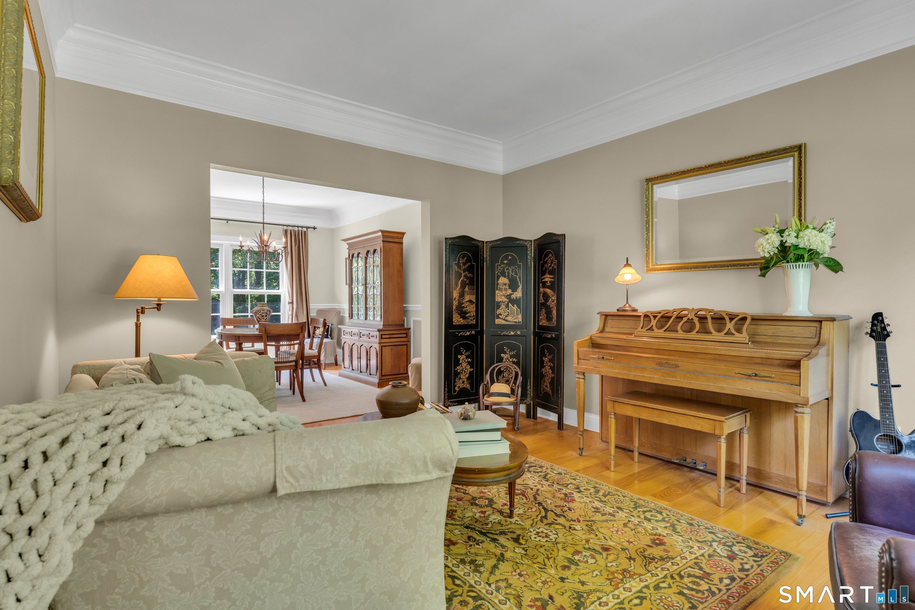 474 State Street Guilford, CT 06437 - Photo 8 of 40 a living room with furniture and a fireplace