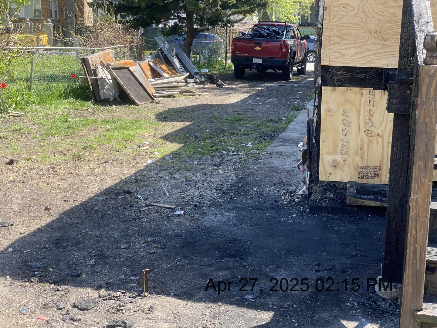 4922 West Ferdinand Street Chicago, IL 60644 - Photo 6 of 9 a view of a backyard with barbeque grill