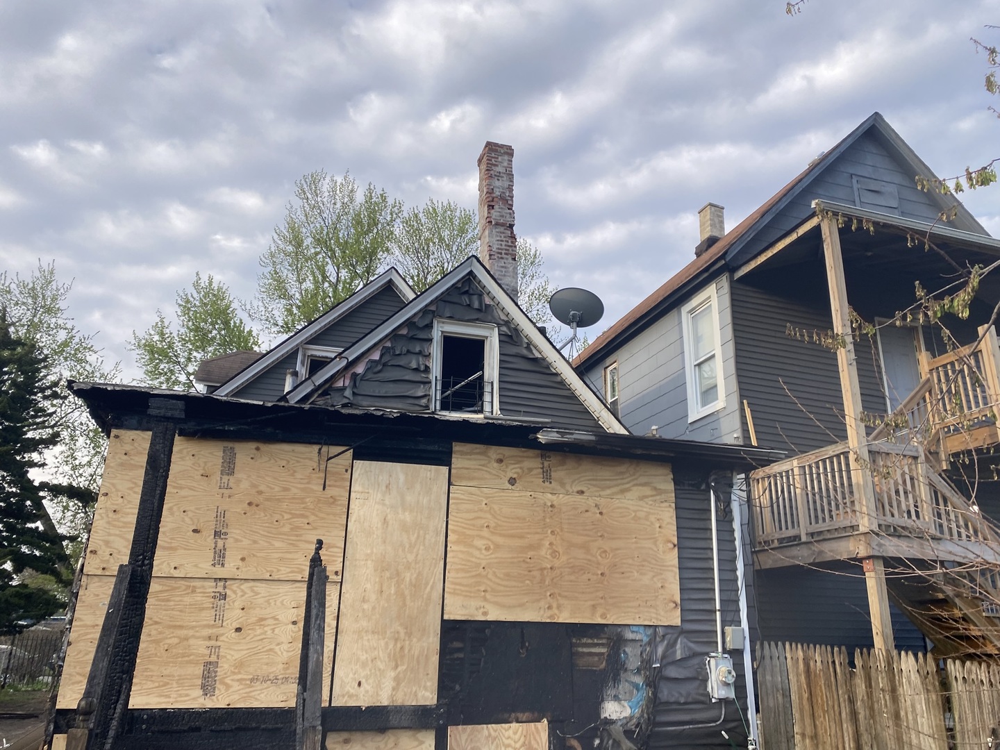4922 West Ferdinand Street Chicago, IL 60644 - Photo 8 of 9 a front view of a house with garden