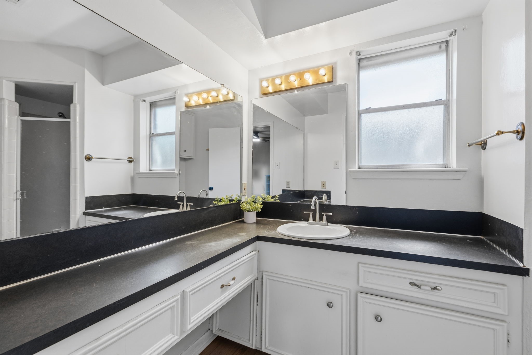 9618 Rannock Way Spring, TX 77379 - Photo 15 of 24 a view of a double vanity sink and a mirror