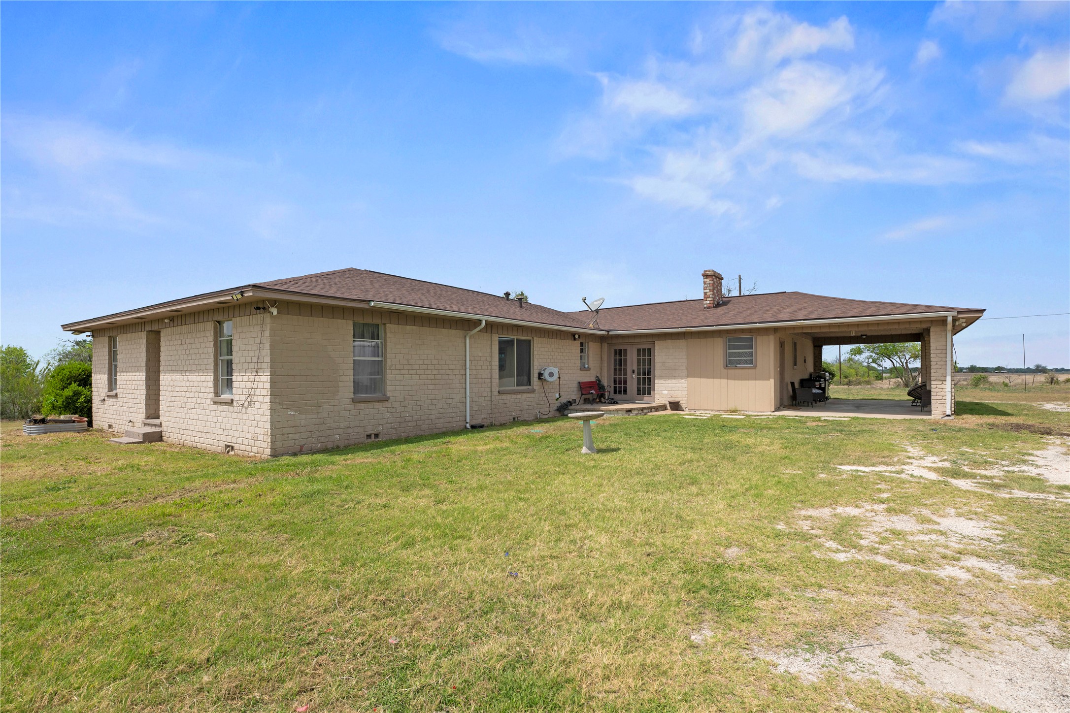 2915 County Road 153 Georgetown, TX 78626 - Photo 22 of 24 a view of a house with backyard and garden