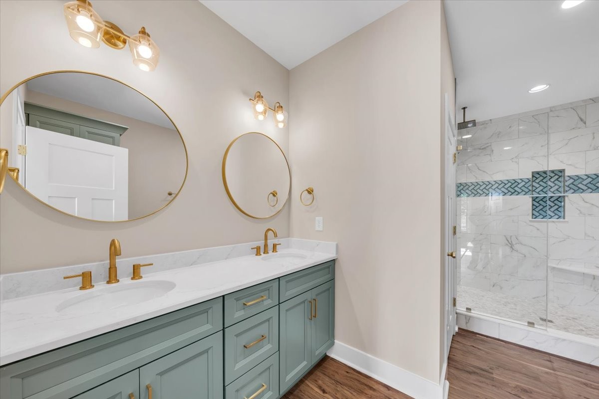139 Brinkley Road Wartrace, TN 37183 - Photo 18 of 41 a bathroom with a double vanity sink mirror and shower