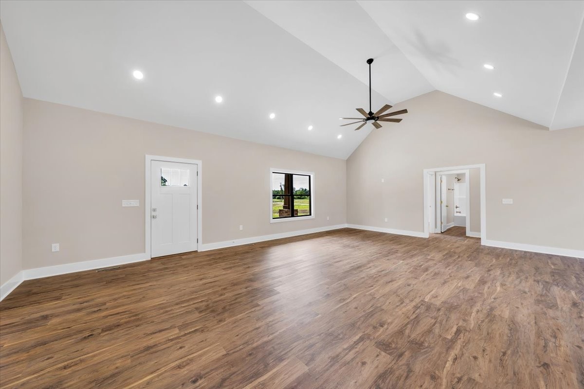 139 Brinkley Road Wartrace, TN 37183 - Photo 2 of 41 a view of empty room with wooden floor and ceiling fan