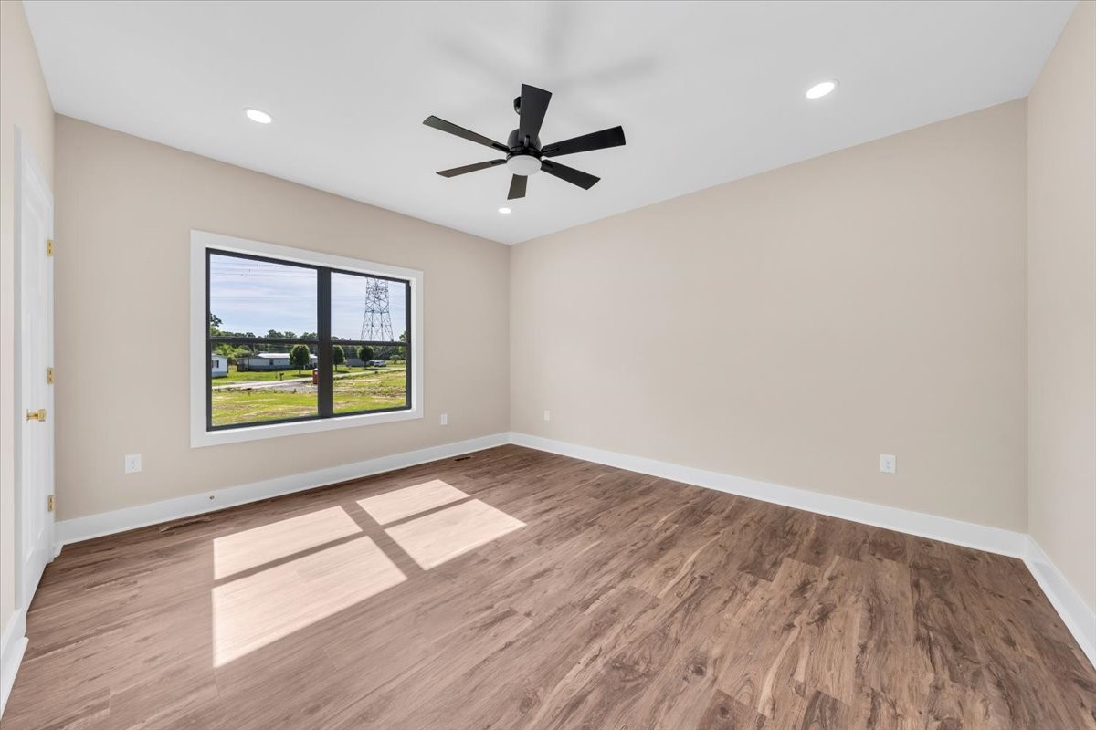 139 Brinkley Road Wartrace, TN 37183 - Photo 27 of 41 wooden floor in an empty room with a window
