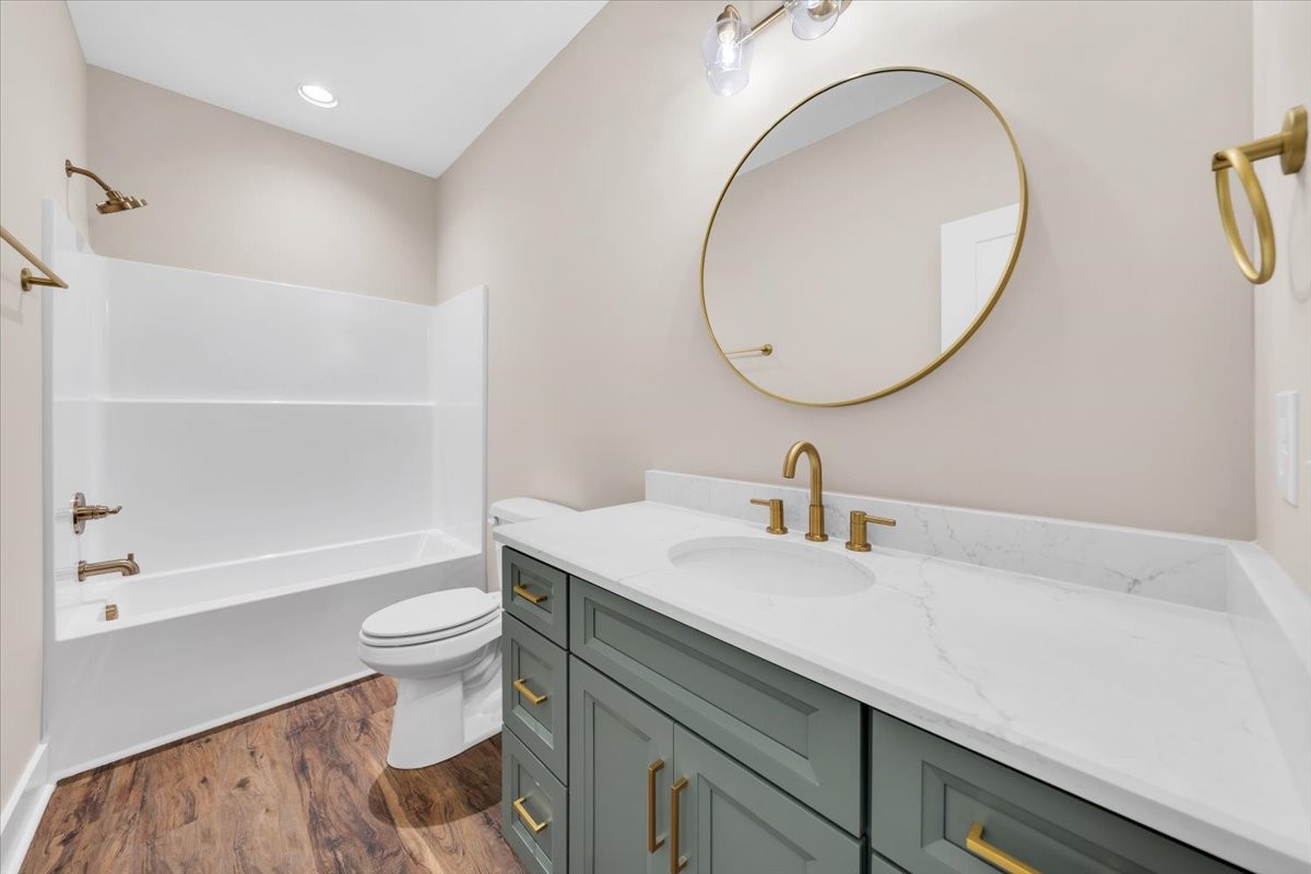 139 Brinkley Road Wartrace, TN 37183 - Photo 29 of 41 a bathroom with a sink a toilet and a mirror