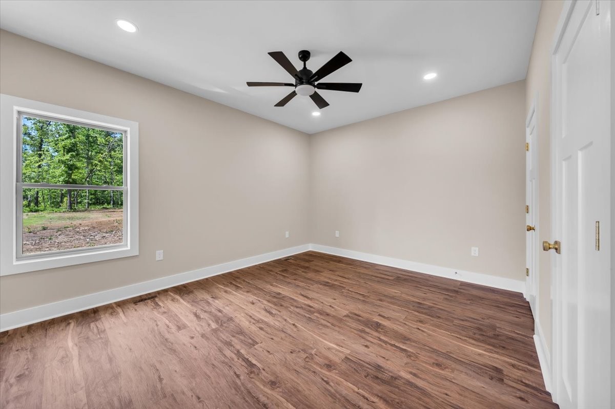 139 Brinkley Road Wartrace, TN 37183 - Photo 30 of 41 wooden floor in an empty room with a window