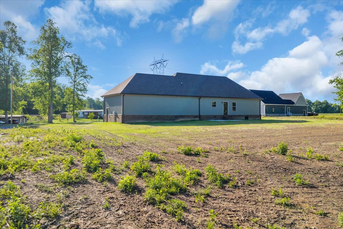139 Brinkley Road Wartrace, TN 37183 - Photo 35 of 41 a view of a house with a big yard