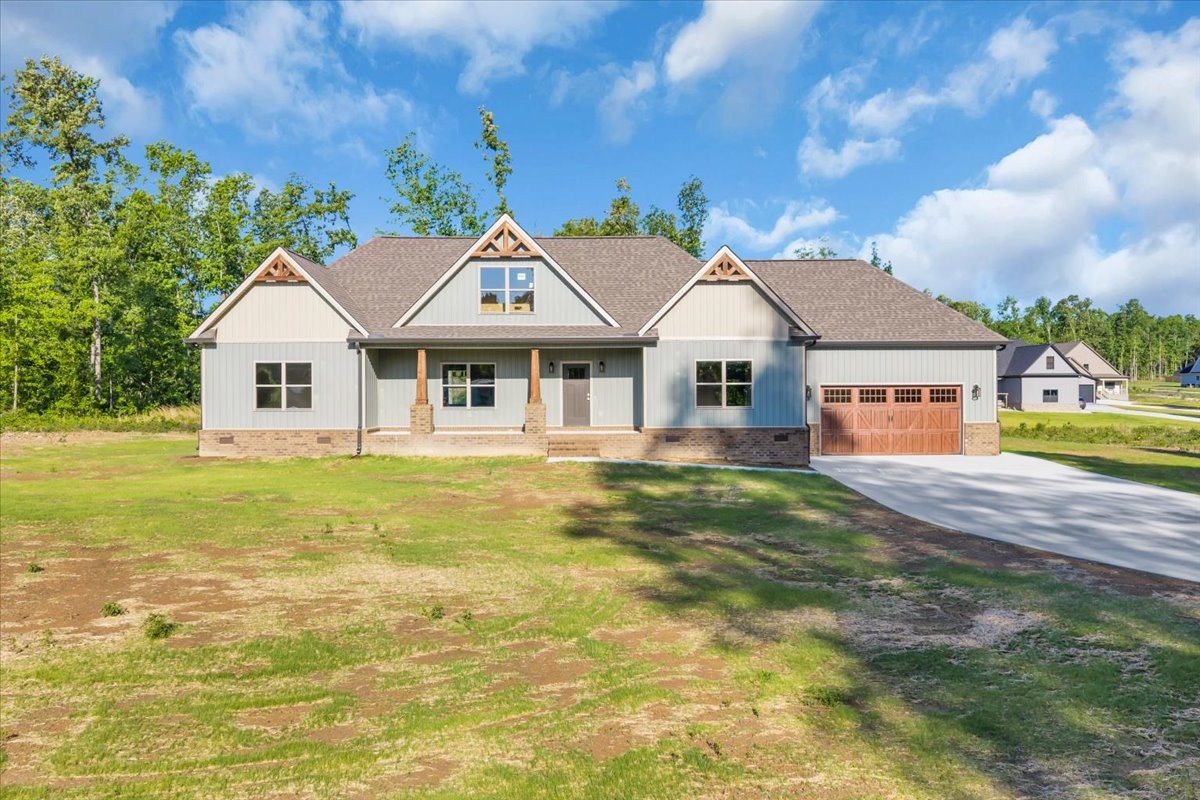 139 Brinkley Road Wartrace, TN 37183 - Photo 37 of 41 a view of a house with swimming pool and sitting area