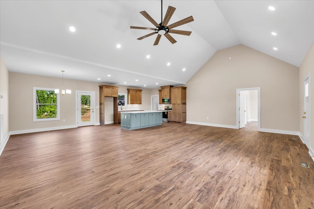 139 Brinkley Road Wartrace, TN 37183 - Photo 4 of 41 a view of a livingroom with a kitchen and wooden floor