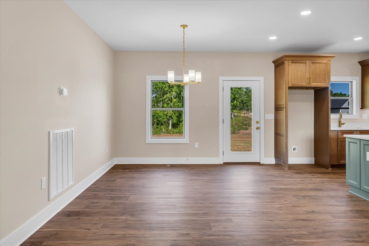 139 Brinkley Road Wartrace, TN 37183 - Photo 8 of 41 a view of a kitchen with furniture wooden floor and window