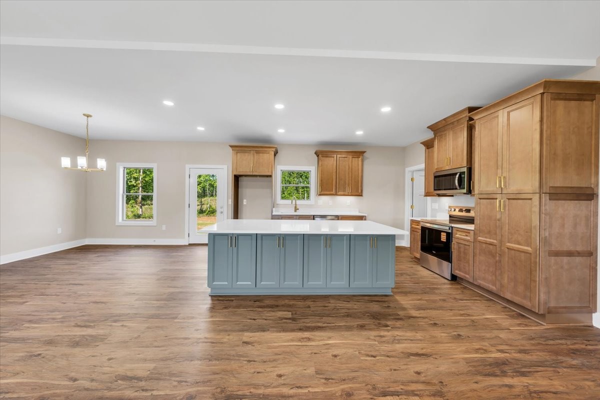 139 Brinkley Road Wartrace, TN 37183 - Photo 10 of 41 a large kitchen with a large counter top stainless steel appliances and window