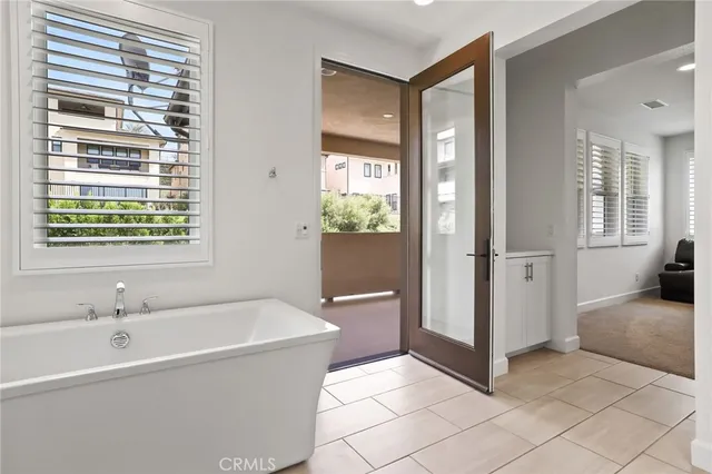 a view of a house with swimming pool and furniture